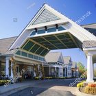Entrance canopy of an assisted living community decorated for autumn